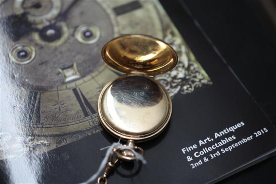 A George V 9ct gold Waltham half hunter pocket watch, on 15ct gold albert with 9ct gold gem set fob,